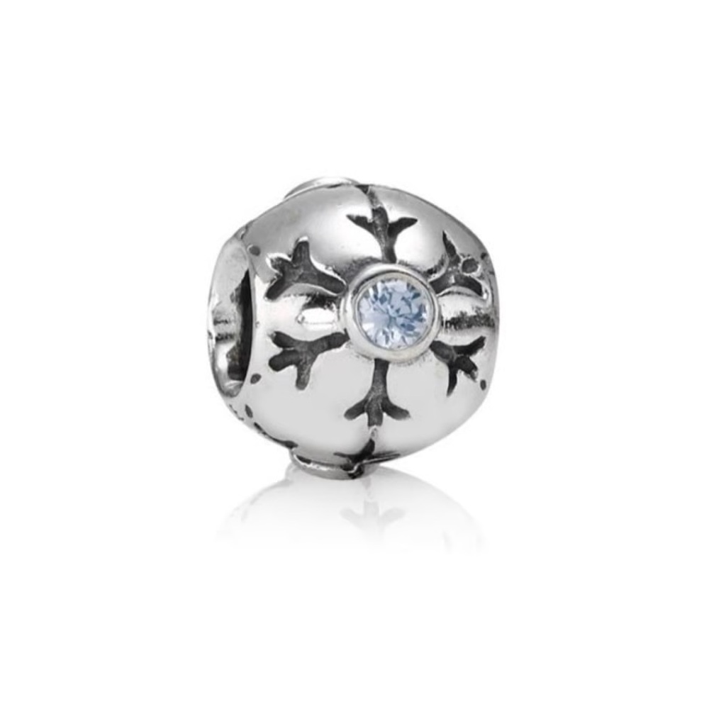 Pandora silver and blue topaz snowflake retired charm